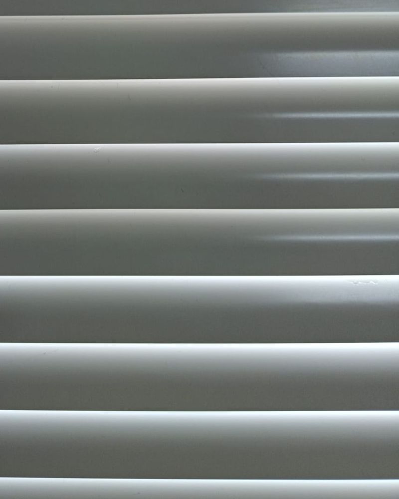 Same white venetian blinds rust-free and bright after cleaning
