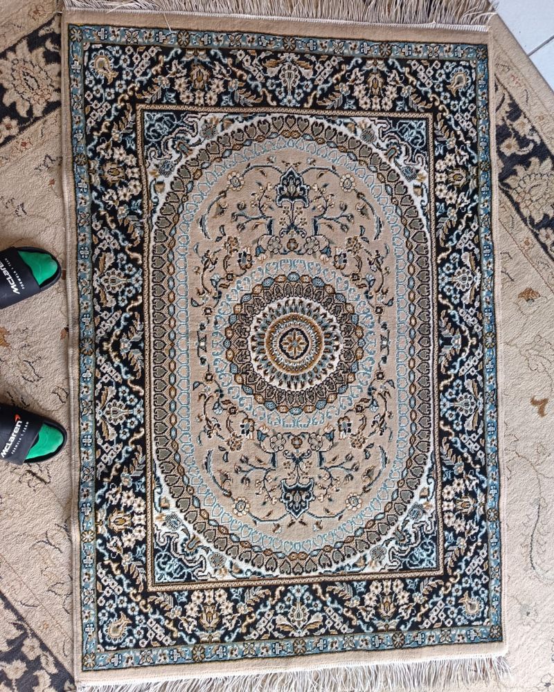 Same Persian-style rug with bright, crisp colours after cleaning