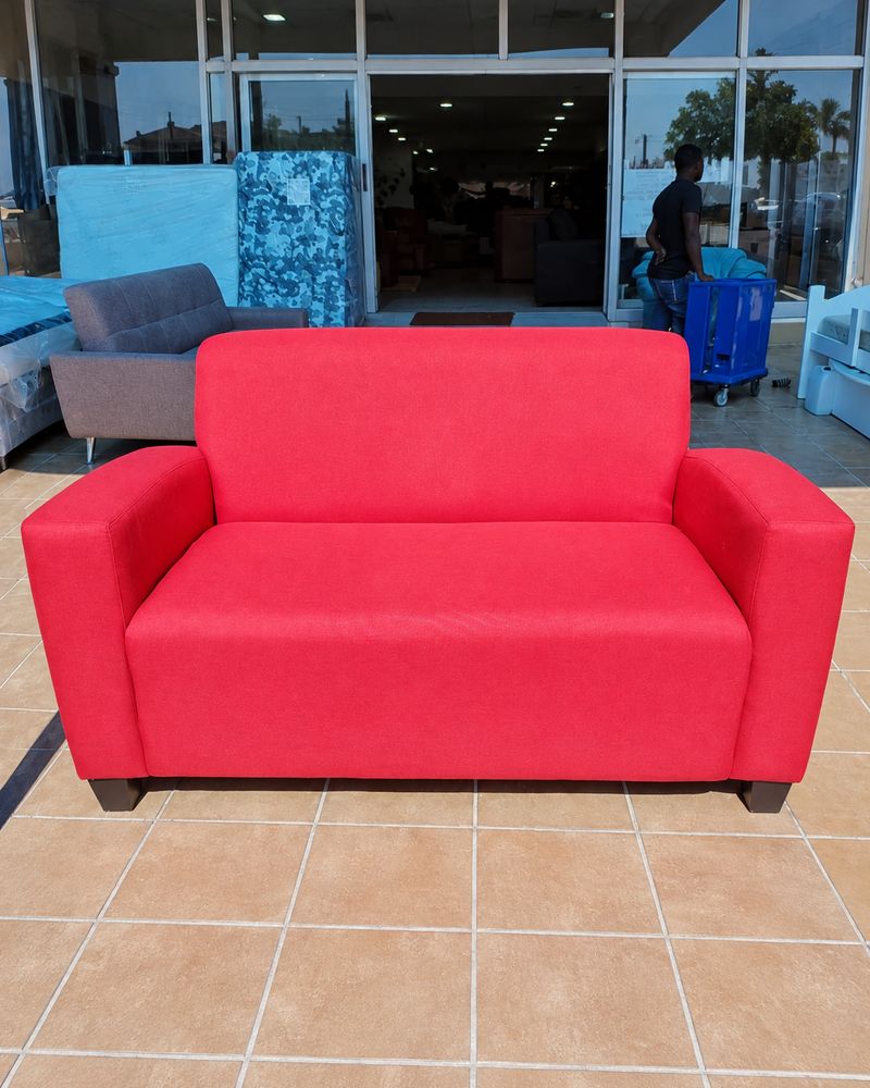 Red fabric couch bright and fresh after upholstery cleaning